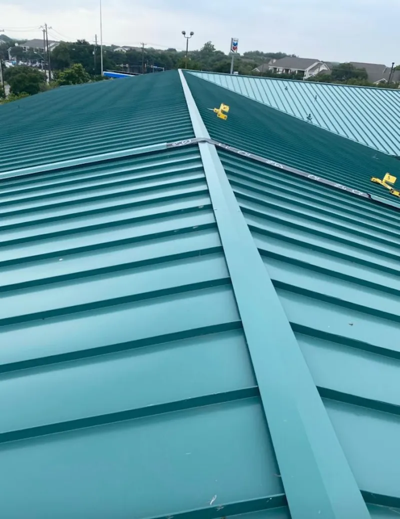 Green commercial metal roof ridge and valley for Metal Roof Repair in Crooked River Ranch